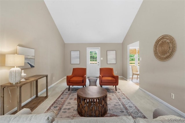 12203 King Cotton Ct, Midlothian, VA 23112 - carpeted living room with baseboards and high vaulted ceiling