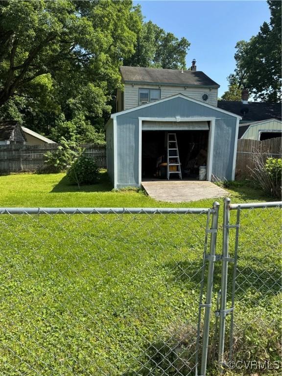 3530 Gilbert St, Hopewell, VA 23860 - garage with a storage unit