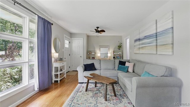 2207 Marroit Rd, Henrico, VA 23229 - living room featuring healthy amount of natural light, light wood-type flooring, and a ceiling fan
