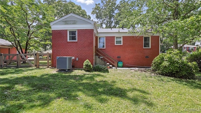 2207 Marroit Rd, Henrico, VA 23229 - back of property featuring cooling unit, brick siding, and stairs