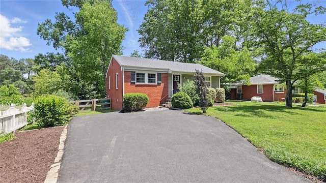 2207 Marroit Rd, Henrico, VA 23229 - view of front facade with brick siding and asphalt driveway