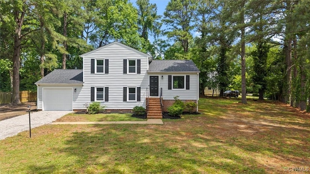 1121 Collingwood Dr, North Prince George, VA 23860 - split level home featuring a garage, gravel driveway, and roof with shingles