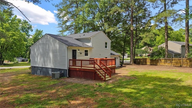 1121 Collingwood Dr, North Prince George, VA 23860 - rear view of property featuring a wooden deck, cooling unit, and a shingled roof
