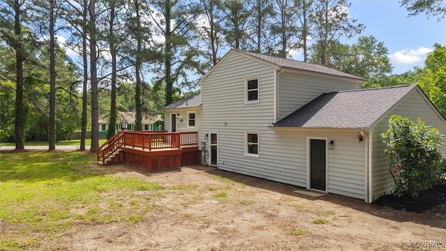 1121 Collingwood Dr, North Prince George, VA 23860 - back of house with a wooden deck, a shingled roof, and a yard