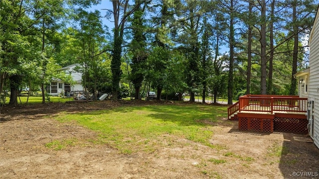 1121 Collingwood Dr, North Prince George, VA 23860 - view of green lawn with a wooden deck