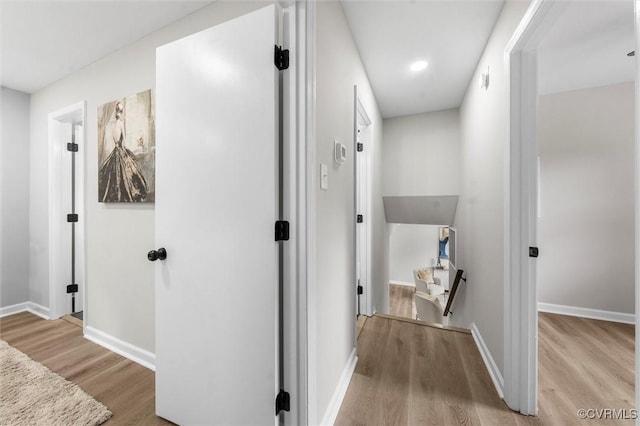 1121 Collingwood Dr, North Prince George, VA 23860 - hallway featuring light wood-type flooring, baseboards, and recessed lighting