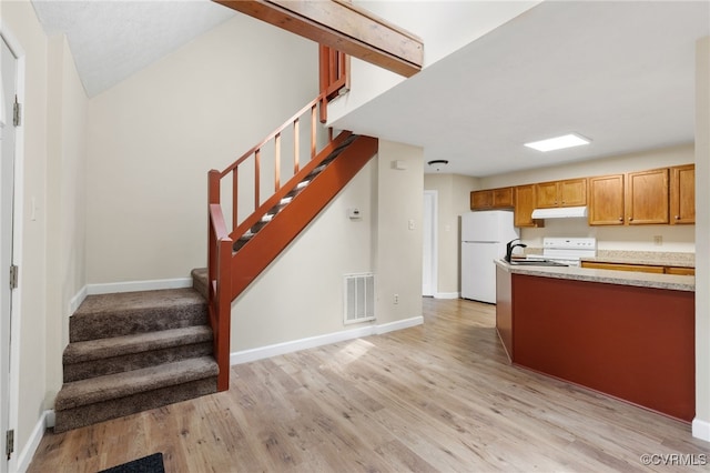 8418 Scottingham Ct, North Chesterfield, VA 23236 - kitchen featuring freestanding refrigerator, light countertops, light wood-style flooring, baseboards, and electric stove