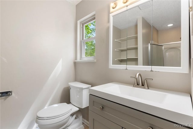 8418 Scottingham Ct, North Chesterfield, VA 23236 - full bathroom with toilet, vanity, a textured ceiling, and a shower