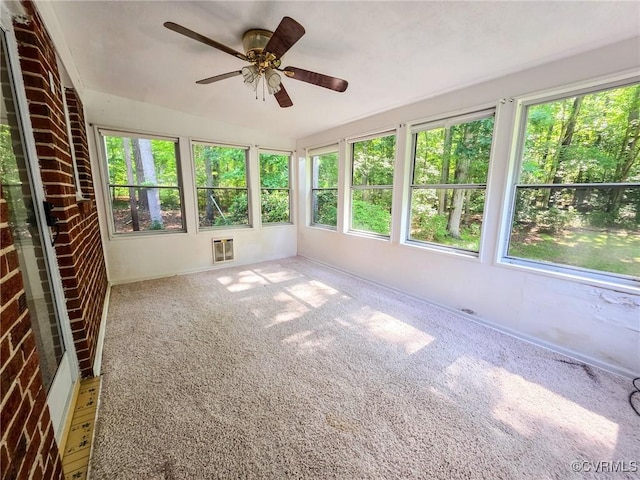 16121 Rowlett Rd, Chesterfield, VA 23838 - unfurnished sunroom featuring plenty of natural light and ceiling fan