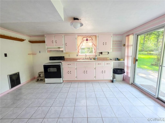 16121 Rowlett Rd, Chesterfield, VA 23838 - kitchen featuring range with electric stovetop, a sink, under cabinet range hood, light countertops, and white cabinets