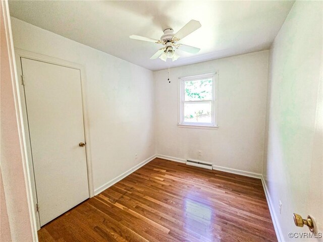 16121 Rowlett Rd, Chesterfield, VA 23838 - empty room with a baseboard radiator, wood finished floors, a ceiling fan, and baseboards
