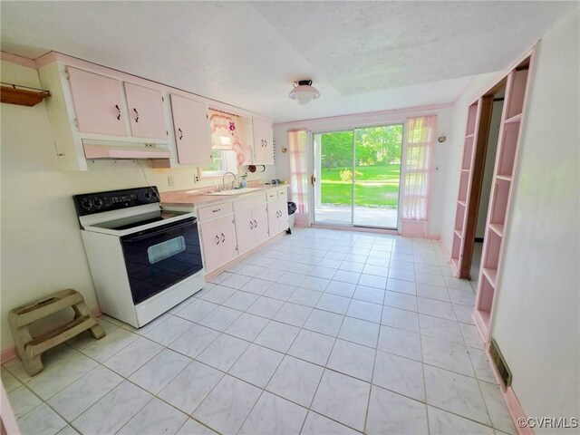 16121 Rowlett Rd, Chesterfield, VA 23838 - kitchen featuring electric range oven, under cabinet range hood, light countertops, and white cabinets