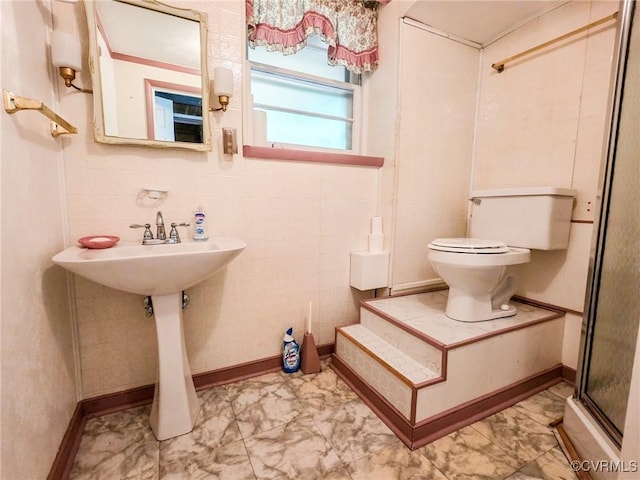 16121 Rowlett Rd, Chesterfield, VA 23838 - bathroom featuring a shower stall, toilet, and marble finish flooring