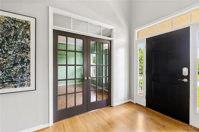 4824 Hilbay Ter, Moseley, VA 23120 - foyer with french doors, wood finished floors, and baseboards
