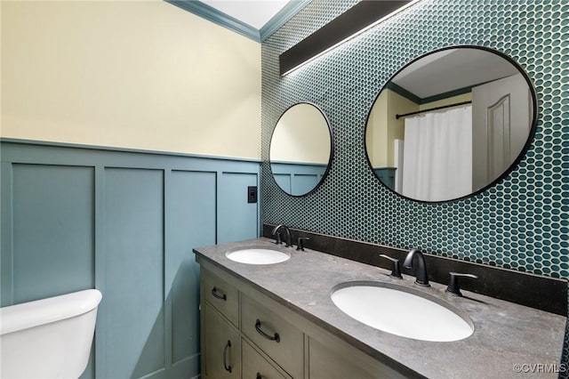 4824 Hilbay Ter, Moseley, VA 23120 - full bathroom featuring ornamental molding, toilet, double vanity, and a decorative wall