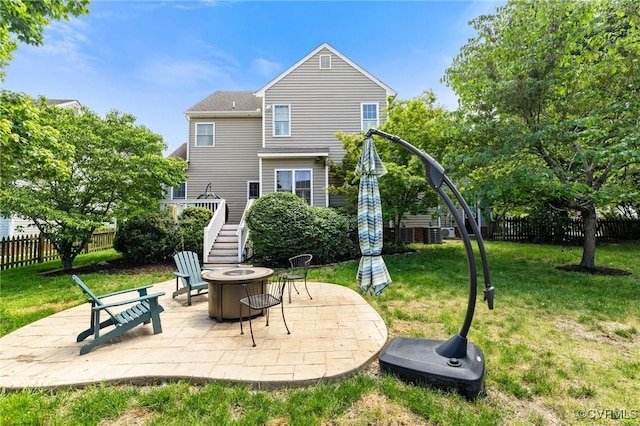 4824 Hilbay Ter, Moseley, VA 23120 - rear view of house featuring a fire pit, stairs, and a patio area
