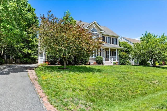 4824 Hilbay Ter, Moseley, VA 23120 - view of front of property with a porch, a front yard, a garage, and driveway