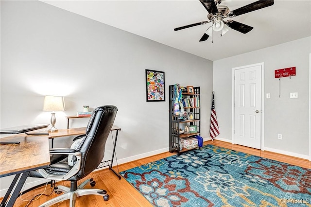 506 N 28th St, Richmond, VA 23223 - home office featuring ceiling fan, wood finished floors, and baseboards