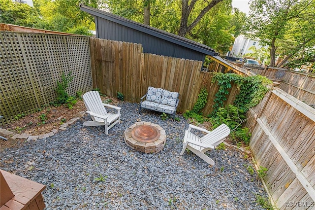 506 N 28th St, Richmond, VA 23223 - fenced backyard with a fire pit