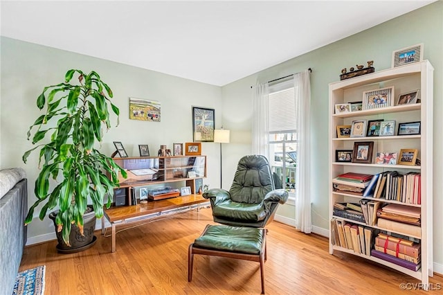 506 N 28th St, Richmond, VA 23223 - living area with baseboards and wood finished floors