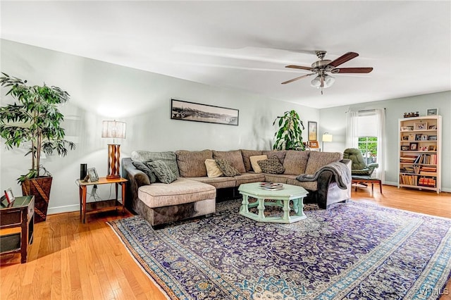506 N 28th St, Richmond, VA 23223 - living area with a ceiling fan, light wood-type flooring, and baseboards
