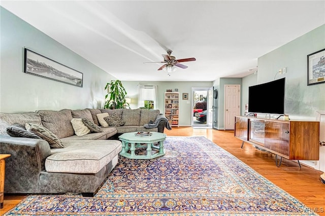 506 N 28th St, Richmond, VA 23223 - living room featuring ceiling fan and light wood-style floors