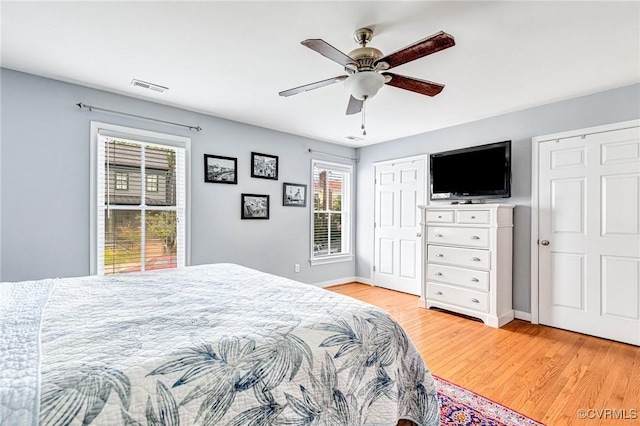 506 N 28th St, Richmond, VA 23223 - bedroom featuring light wood-style flooring, baseboards, and ceiling fan