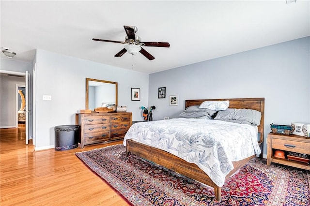 506 N 28th St, Richmond, VA 23223 - bedroom featuring light wood finished floors, a ceiling fan, and baseboards