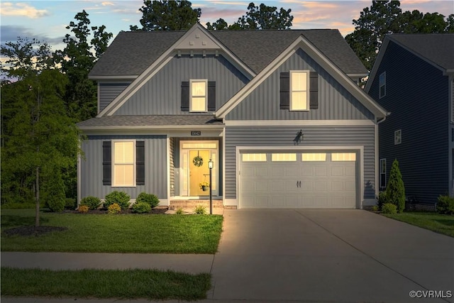 13042 Fieldfare Dr, Midlothian, VA 23112 - view of front of house with board and batten siding, concrete driveway, roof with shingles, and a front yard