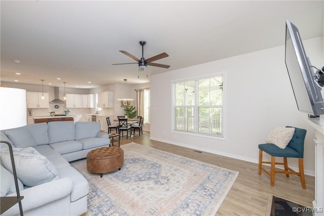 13042 Fieldfare Dr, Midlothian, VA 23112 - living room featuring ceiling fan, light wood-style flooring, baseboards, and recessed lighting
