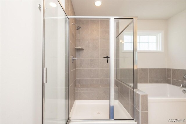13042 Fieldfare Dr, Midlothian, VA 23112 - full bathroom featuring a bath, a stall shower, and recessed lighting