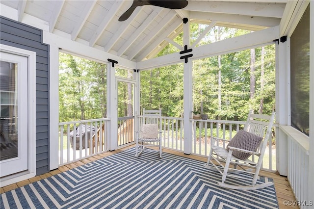 13042 Fieldfare Dr, Midlothian, VA 23112 - sunroom / solarium featuring a ceiling fan, vaulted ceiling, and view of wooded area