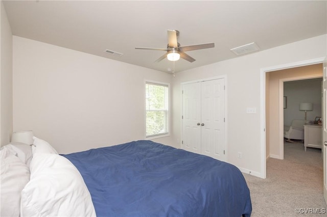 13042 Fieldfare Dr, Midlothian, VA 23112 - bedroom featuring light colored carpet, baseboards, ceiling fan, and a closet