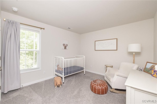 13042 Fieldfare Dr, Midlothian, VA 23112 - carpeted bedroom featuring multiple windows, baseboards, and a crib