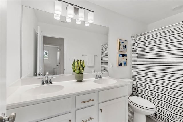 15637 Cedarville Dr, Midlothian, VA 23112 - full bath with double vanity, toilet, and a shower with shower curtain