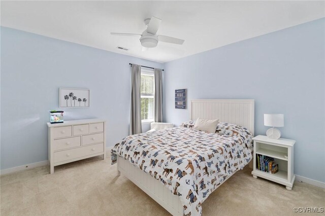 15637 Cedarville Dr, Midlothian, VA 23112 - bedroom with light carpet, a ceiling fan, and baseboards
