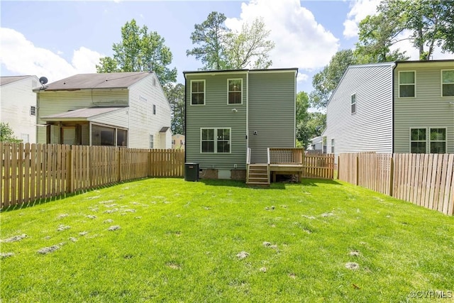 5415 Edgefield St, Henrico, VA 23227 - back of property with a wooden deck and cooling unit