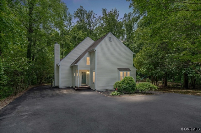 13503 Headwaters Pl, Midlothian, VA 23113 - view of front facade with a chimney and asphalt driveway