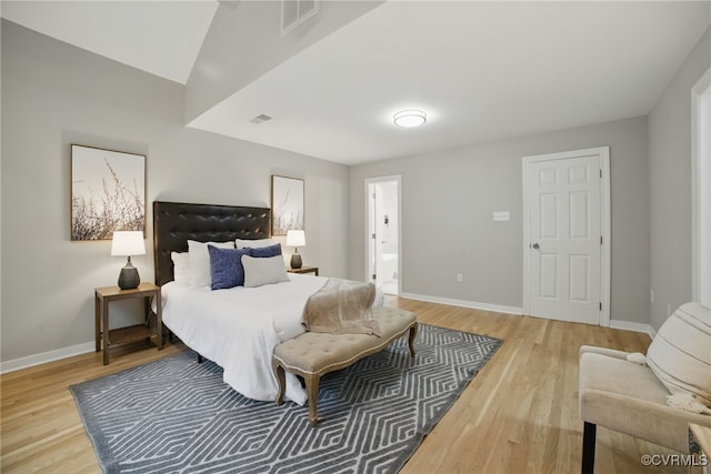 11320 Glendevon Rd, Chesterfield, VA 23838 - bedroom with light wood-style floors, baseboards, and ensuite bath