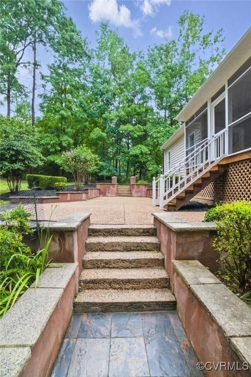 11320 Glendevon Rd, Chesterfield, VA 23838 - view of patio with stairway and a sunroom