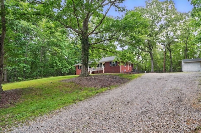 6286 Mcclellan Rd, Mechanicsville, VA 23111 - view of front of house featuring driveway, brick siding, a garage, and a front lawn