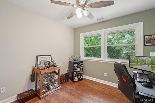 6286 Mcclellan Rd, Mechanicsville, VA 23111 - office area with baseboards, a ceiling fan, and wood finished floors