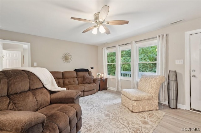 6286 Mcclellan Rd, Mechanicsville, VA 23111 - living room featuring light wood-type flooring, ceiling fan, and baseboards