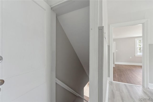 512 St Andrew St, Petersburg, VA 23803 - stairway with wood finished floors, vaulted ceiling, and baseboards