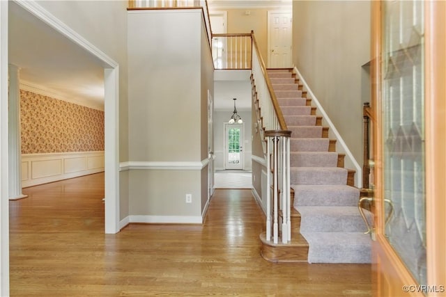11424 Shellharbor Ct, Chesterfield, VA 23838 - entrance foyer with wood finished floors, stairs, crown molding, wainscoting, and baseboards