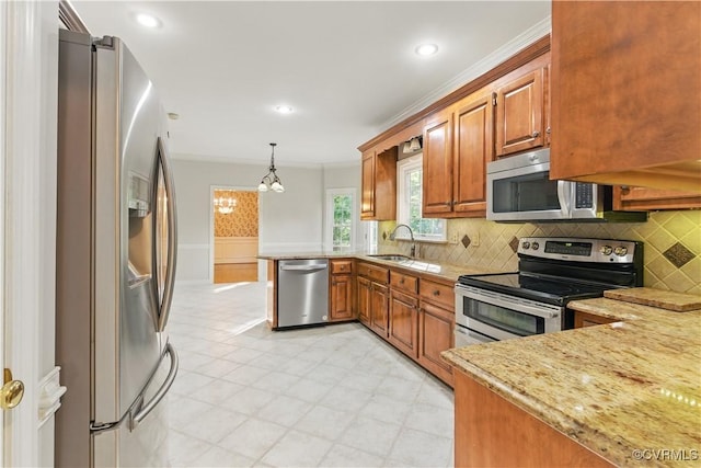 11424 Shellharbor Ct, Chesterfield, VA 23838 - kitchen featuring appliances with stainless steel finishes, a peninsula, a sink, backsplash, and hanging light fixtures
