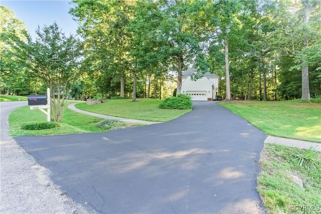 11424 Shellharbor Ct, Chesterfield, VA 23838 - view of front of house featuring a front lawn, a garage, and view of wooded area