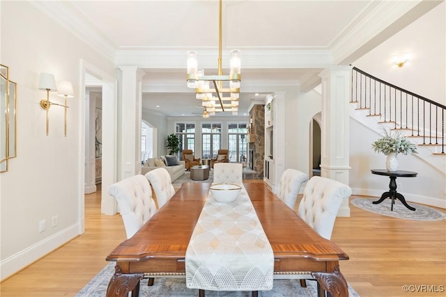 13519 Pungo Ct, Chesterfield, VA 23838 - dining area featuring ornate columns, light wood finished floors, ornamental molding, stairs, and baseboards