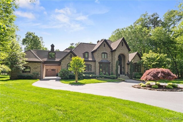 13519 Pungo Ct, Chesterfield, VA 23838 - french provincial home with a front lawn, stone siding, and driveway