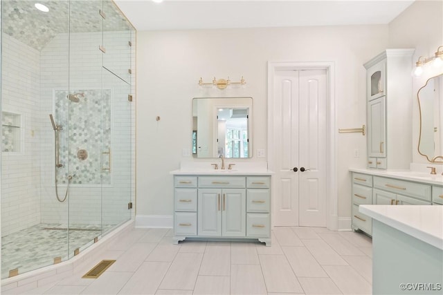 13519 Pungo Ct, Chesterfield, VA 23838 - full bath featuring a stall shower, vanity, tile patterned floors, and baseboards
